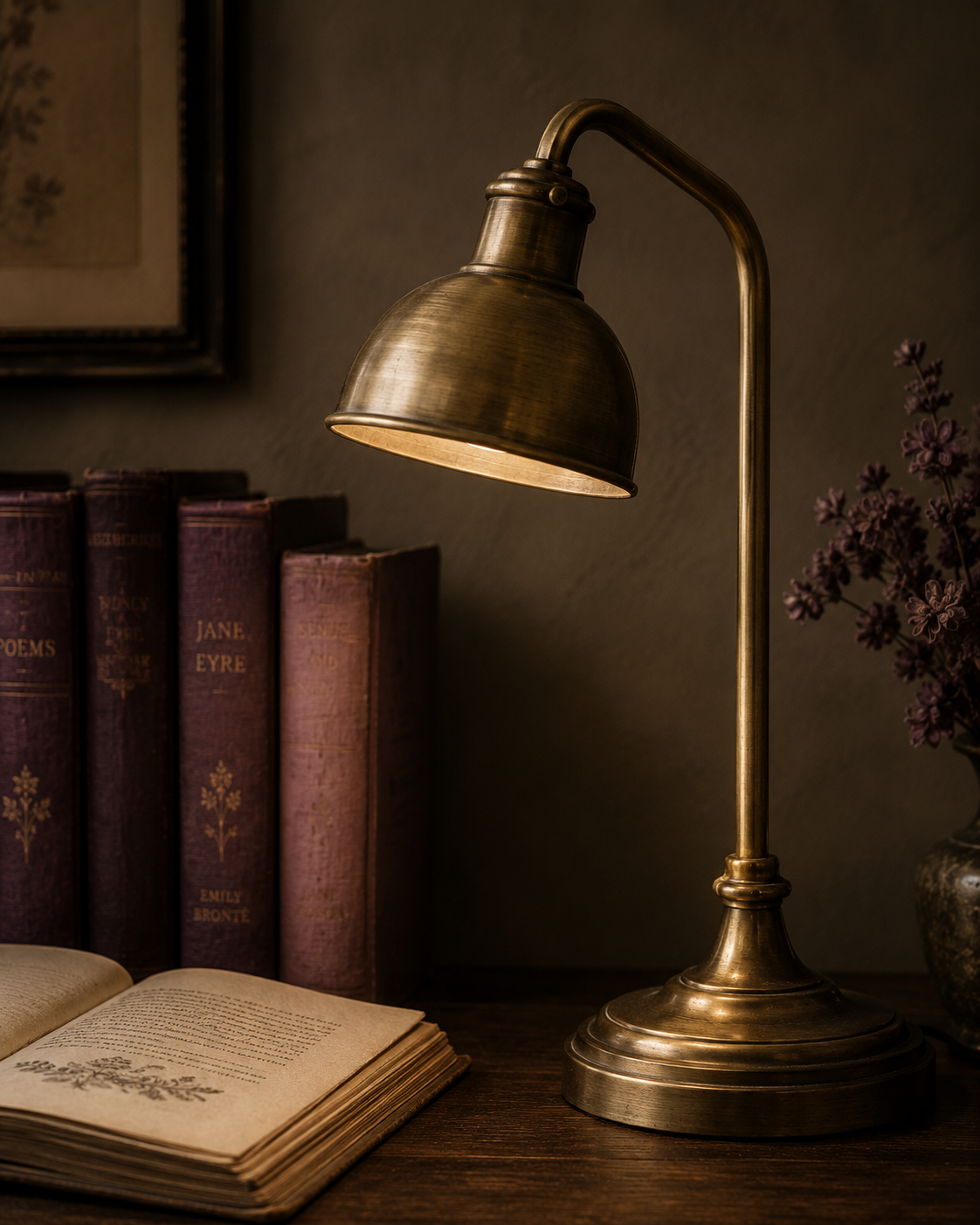 Brass reading lamp beside books